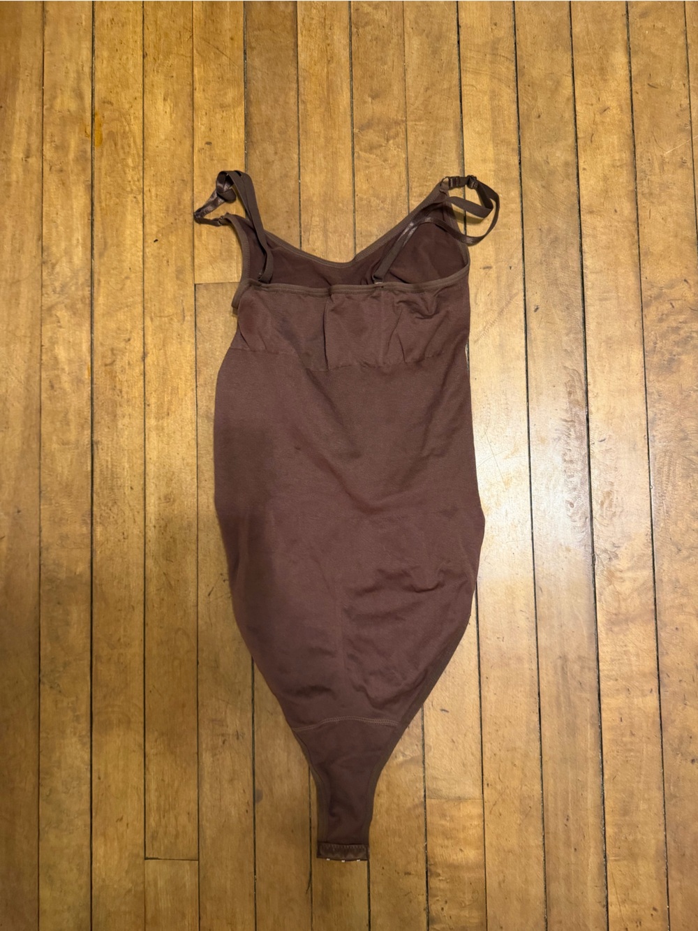 brown body suit